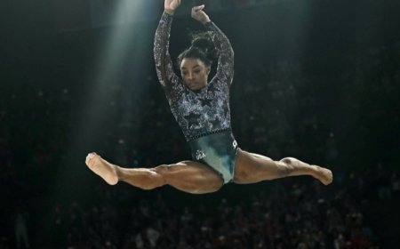 Simone Biles fights through calf injury to produce impressive performance on Olympic return