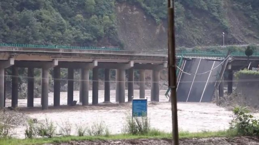 Bridge collapses in China killing 12 and leaving more than 30 missing