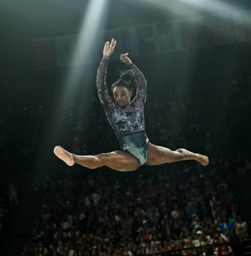 Simone Biles fights through calf injury to produce impressive performance on Olympic return