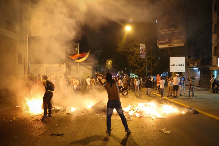 Venezuelans clash with police after disputed election result